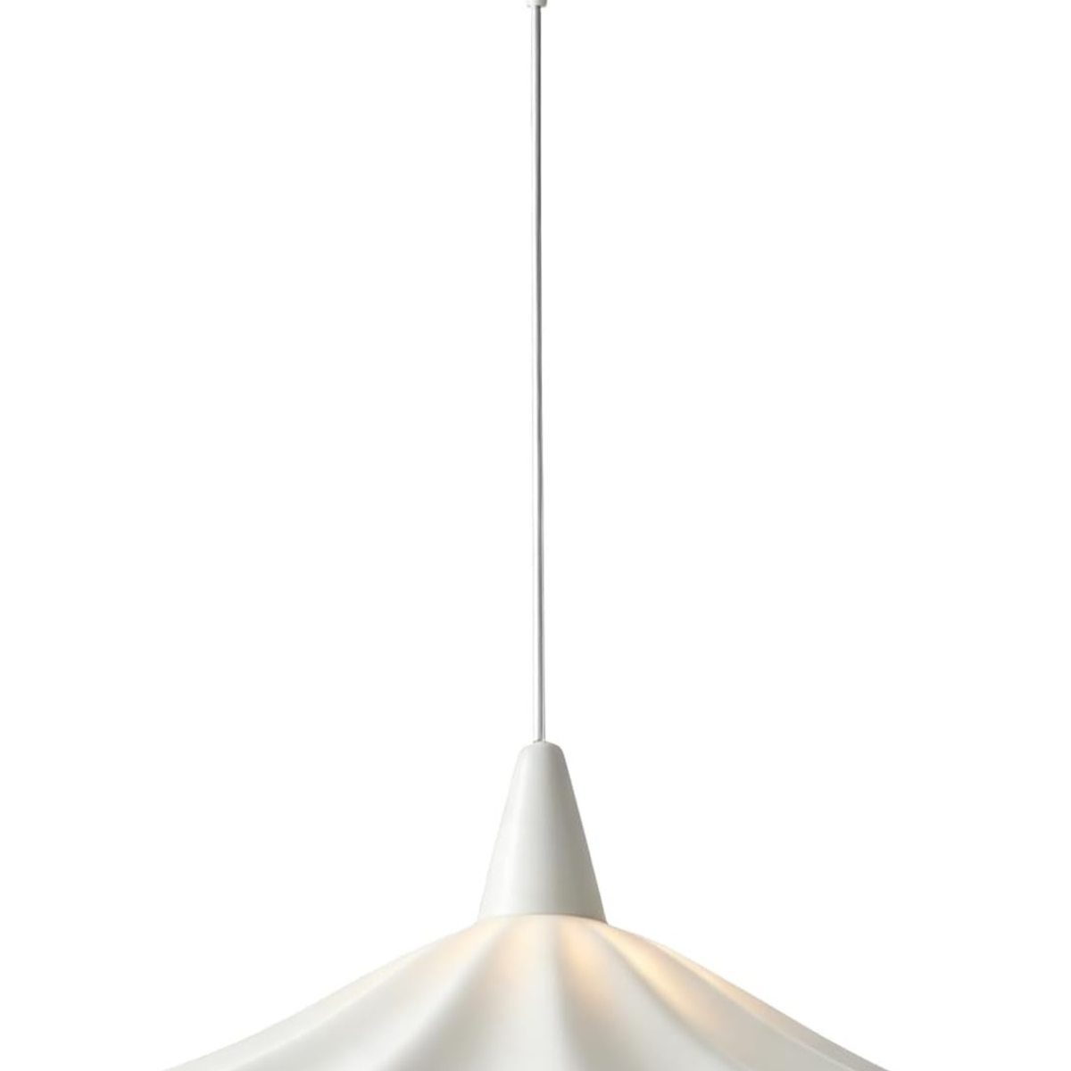 White wavy ceramic pendant light shade hanging above a kitchen island
